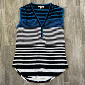 Super cute multi color sleeveless shirt.